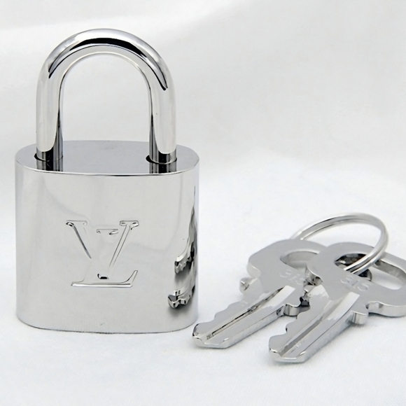 Louis Vuitton Jewelry - RARE Authentic Louis Vuitton Silver Lock & Key Set #315 (PERSTIN CONDITION )